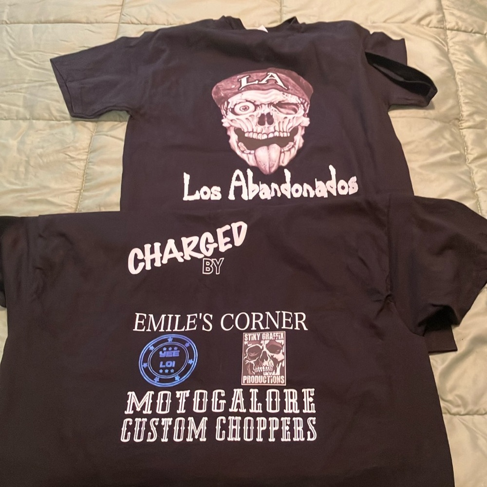 2 shirts one large and one small front and back screened new